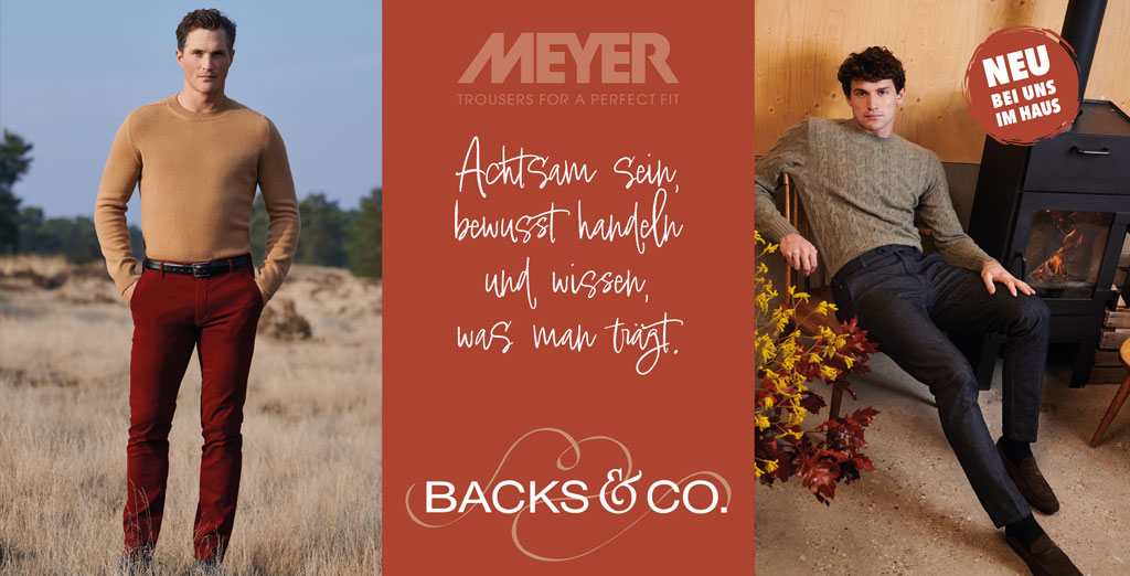 Zwei männliche Models präsentieren die Herbst-/Winter-Kollektion von Meyer Hosen